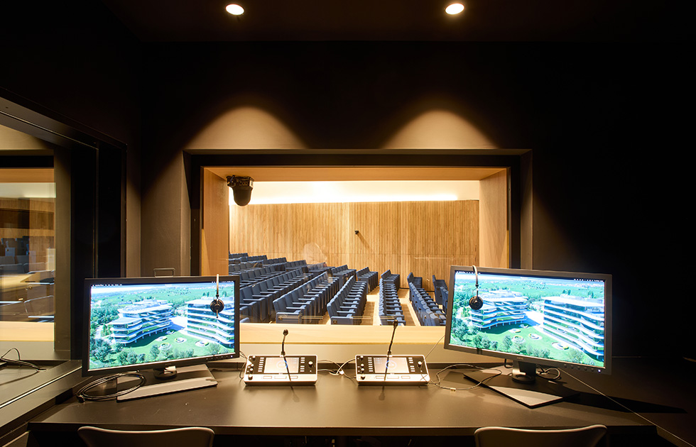 A room designed to facilitate real-time multilingual translation during conferences and events.